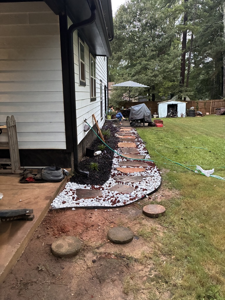 Stone walkway & river rock edge — after