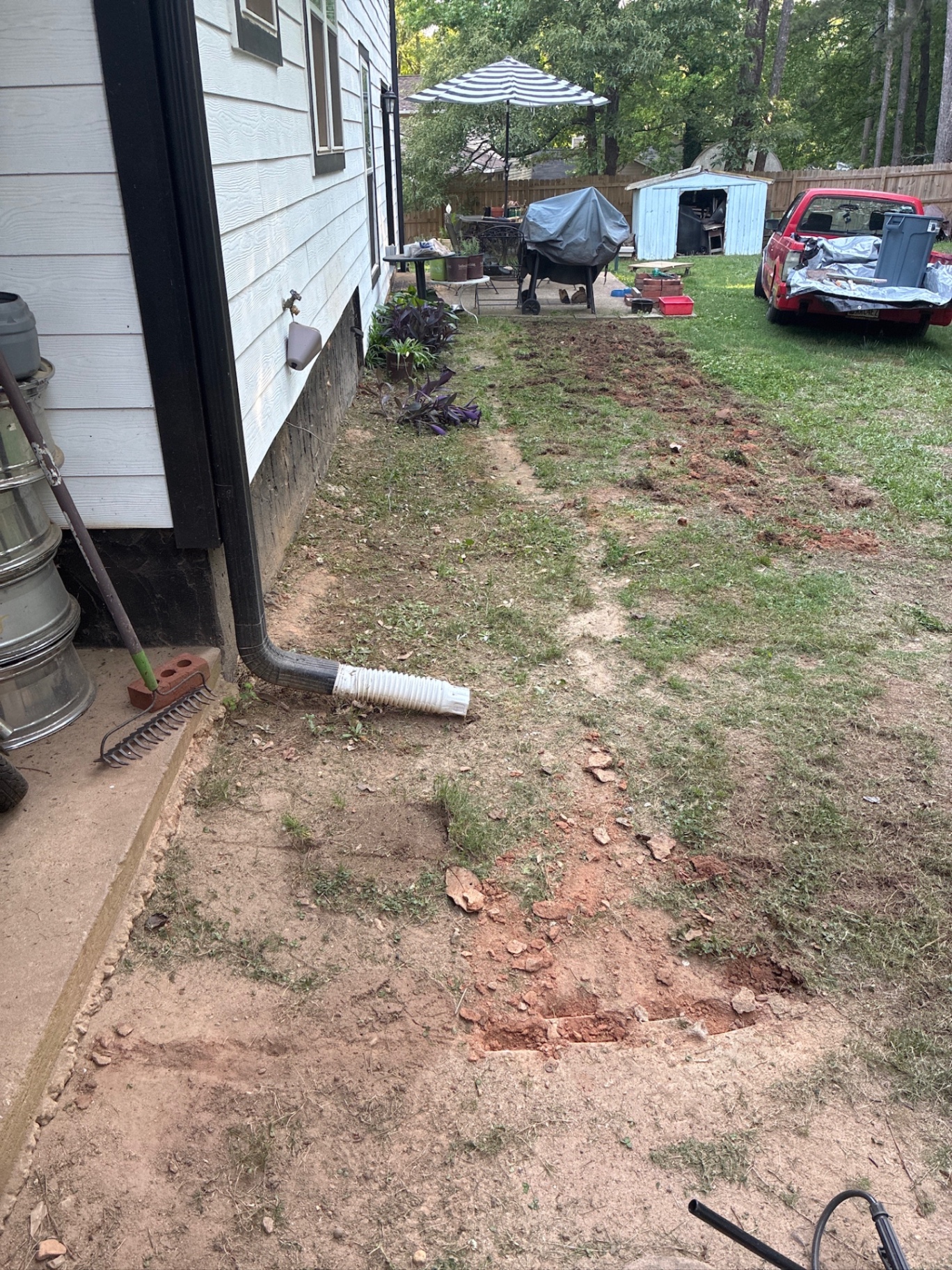Stone walkway & river rock edge — before